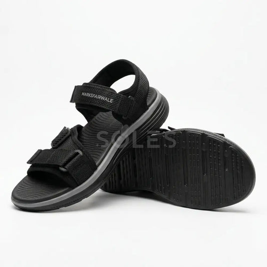 SOLES men's black comfort sandals, pair view showing the grippy outsole and straps