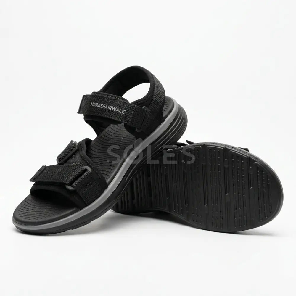 SOLES men's black comfort sandals, pair view showing the grippy outsole and straps