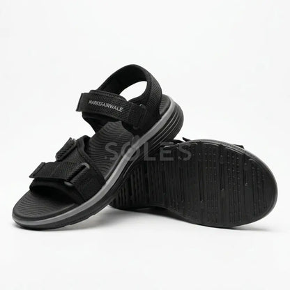 SOLES men's black comfort sandals, pair view showing the grippy outsole and straps